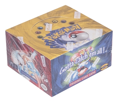 1999 Wizards of the Coast "Pokemon" Unlimited Sealed Unopened Box (36 Packs) - "Blue Wing Charizard" Version